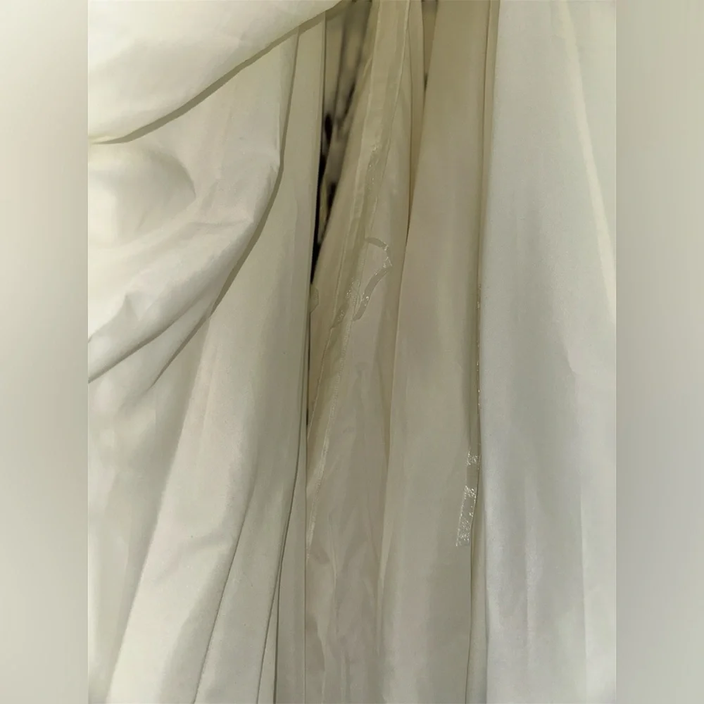 Elegant Ivory Long Sleeve Illusion Wedding Dress with Timeless Charm - Picture 8 of 11